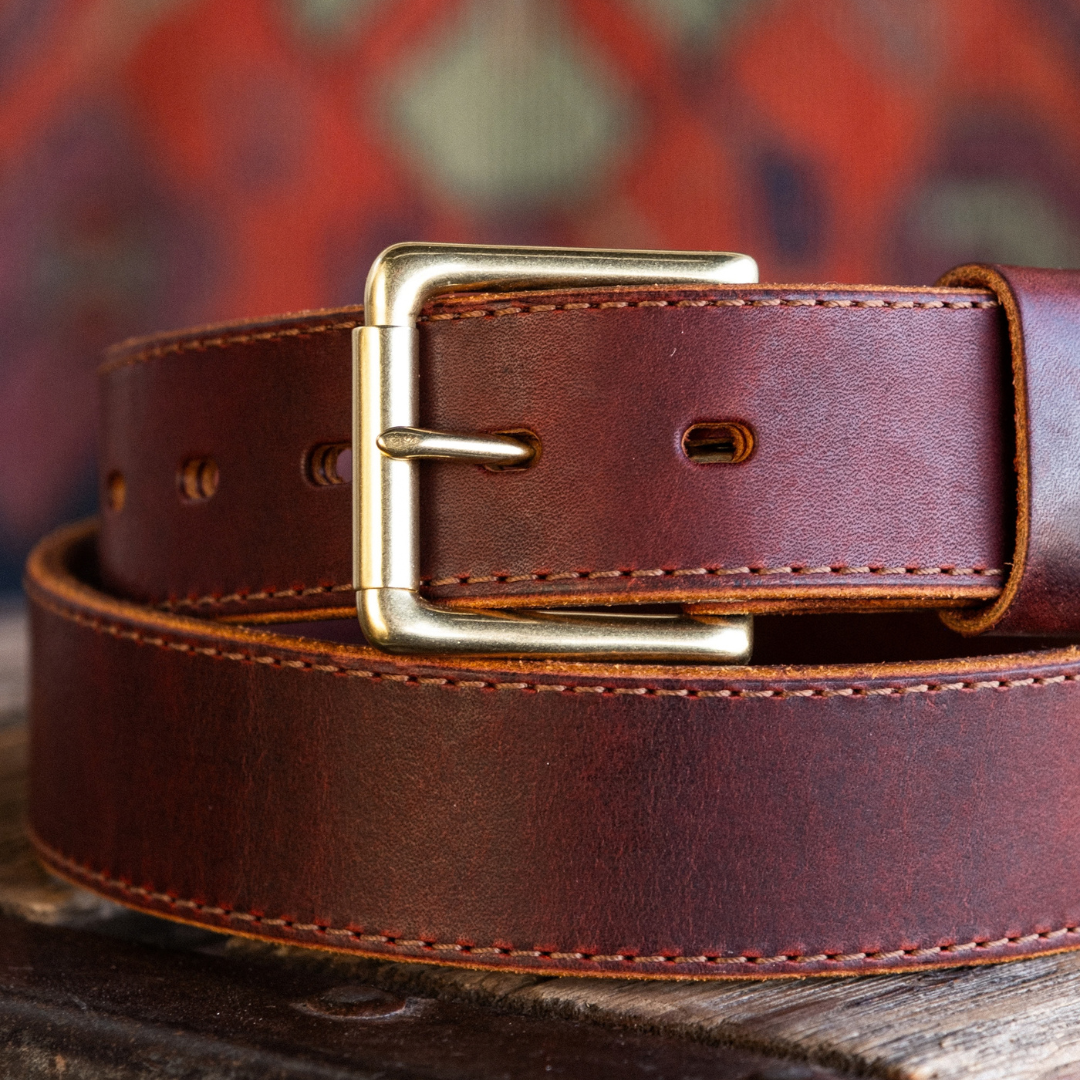 Zoomed in detail shot of buckle on Cypress Raisin Cherry Heritage belt