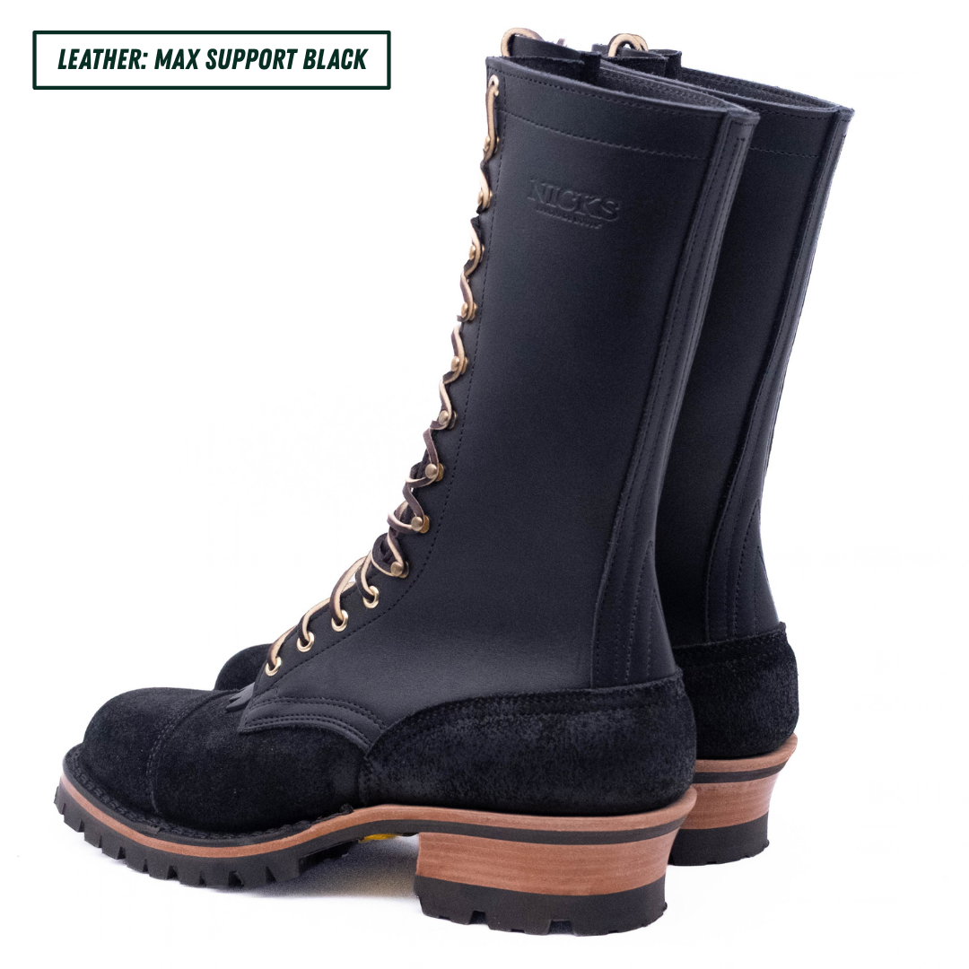 A pair of black leather lace-up boots with tan laces and brown stacked soles, shown on a white background with a text label in the top left corner.