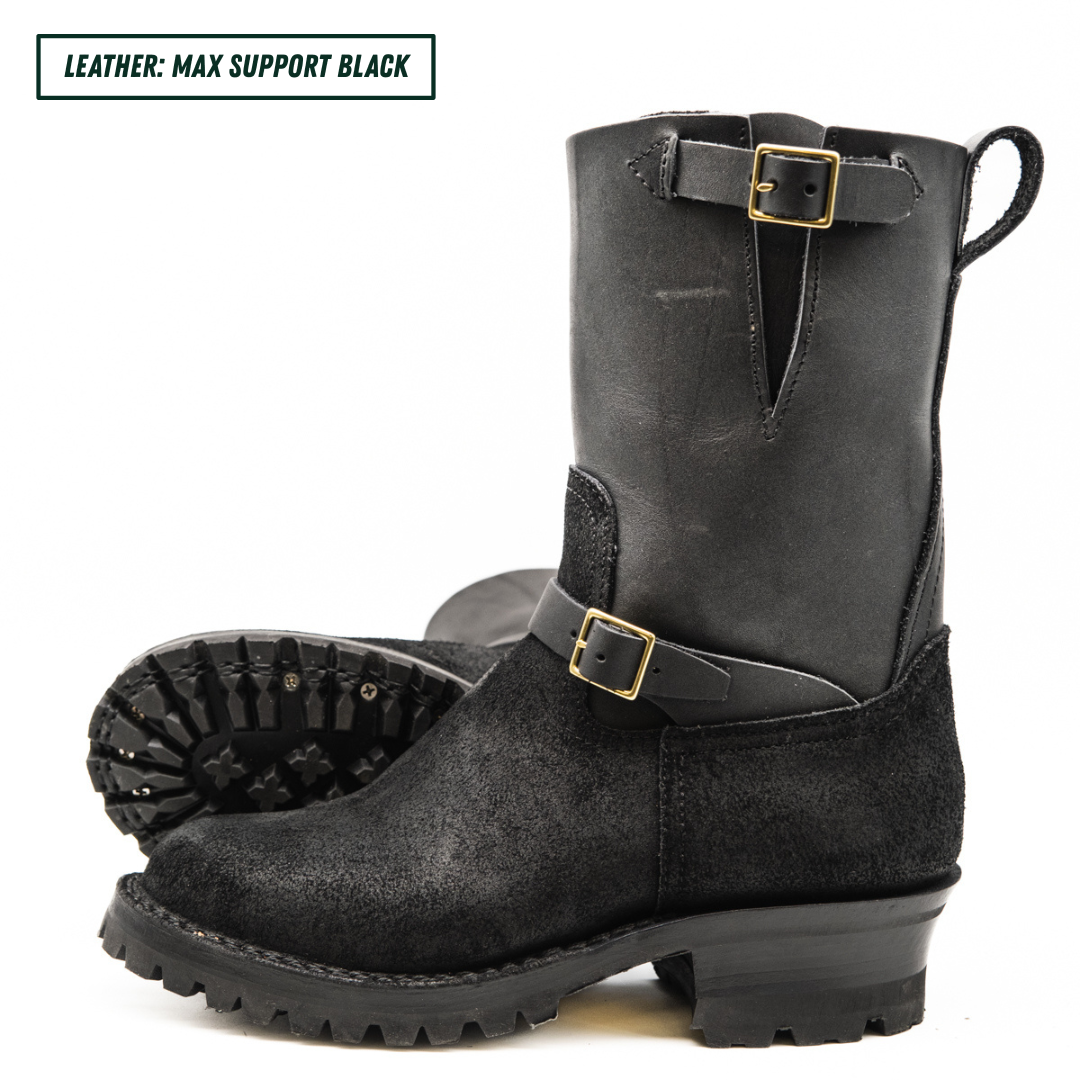 A pair of black leather mid-calf boots with buckle straps, shown on a white background with a text label in the top left corner.