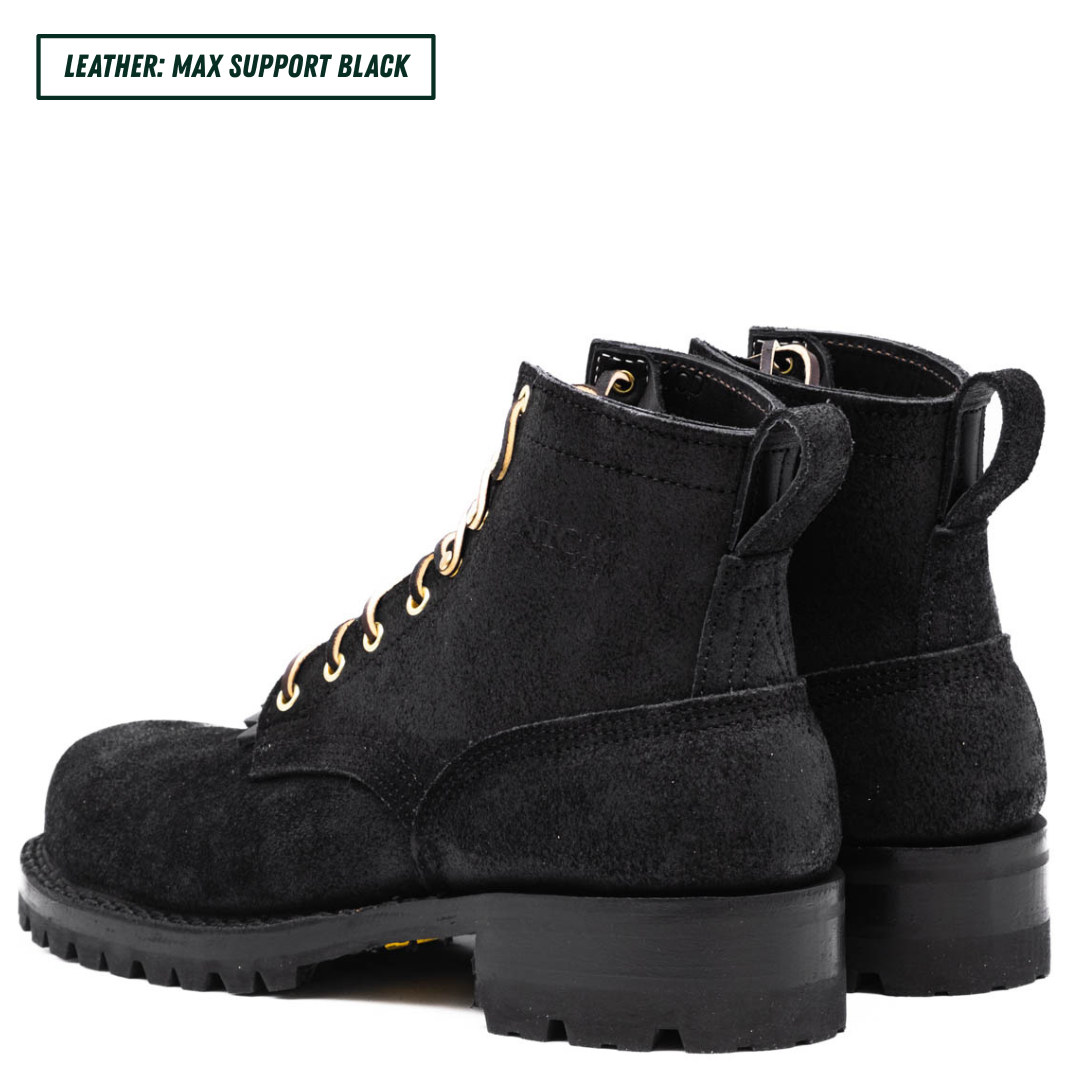 All black leather boots with lug soles. Boots sitting together facing back left. Top left reads "LEATHER: MAX SUPPORT BLACK."