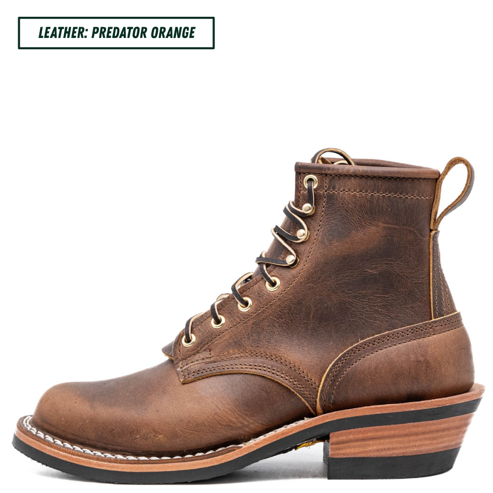 A single brown leather lace-up boot shown in side profile on a white background, with a text label in the top-left corner reading 'LEATHER: PREDATOR ORANGE'. The boot has a distressed medium-brown finish, brass eyelets, white stitching, and a stacked wood-look heel with a black outsole.