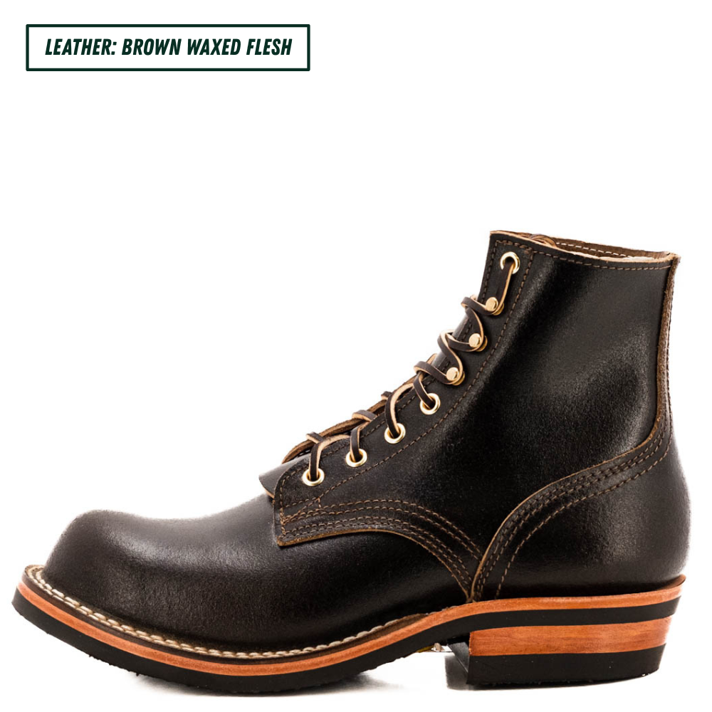 A single dark brown leather lace-up boot shown in side profile on a white background, with a text label in the top-left corner reading 'LEATHER: BROWN WAXED FLESH'. The boot has tan stitching, brass eyelets, and a stacked sole with a tan midlayer and black outsole.