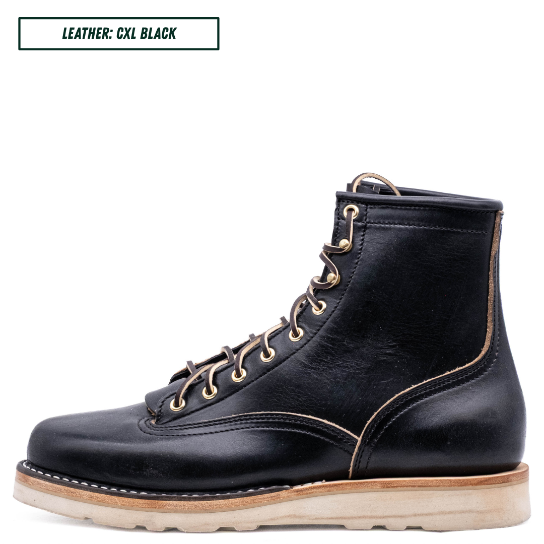A single black leather lace-up boot shown in side profile on a white background, with a small text label in the top-left corner reading 'LEATHER: CXL BLACK'. The boot has tan stitching, brass eyelets, and a light tan outsole.