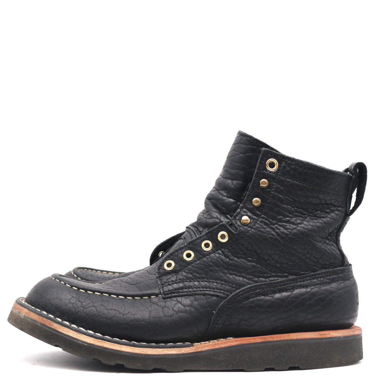A single black leather lace-up ankle boot with gold-tone metal eyelets and stitching, shown from a side profile on a white background.