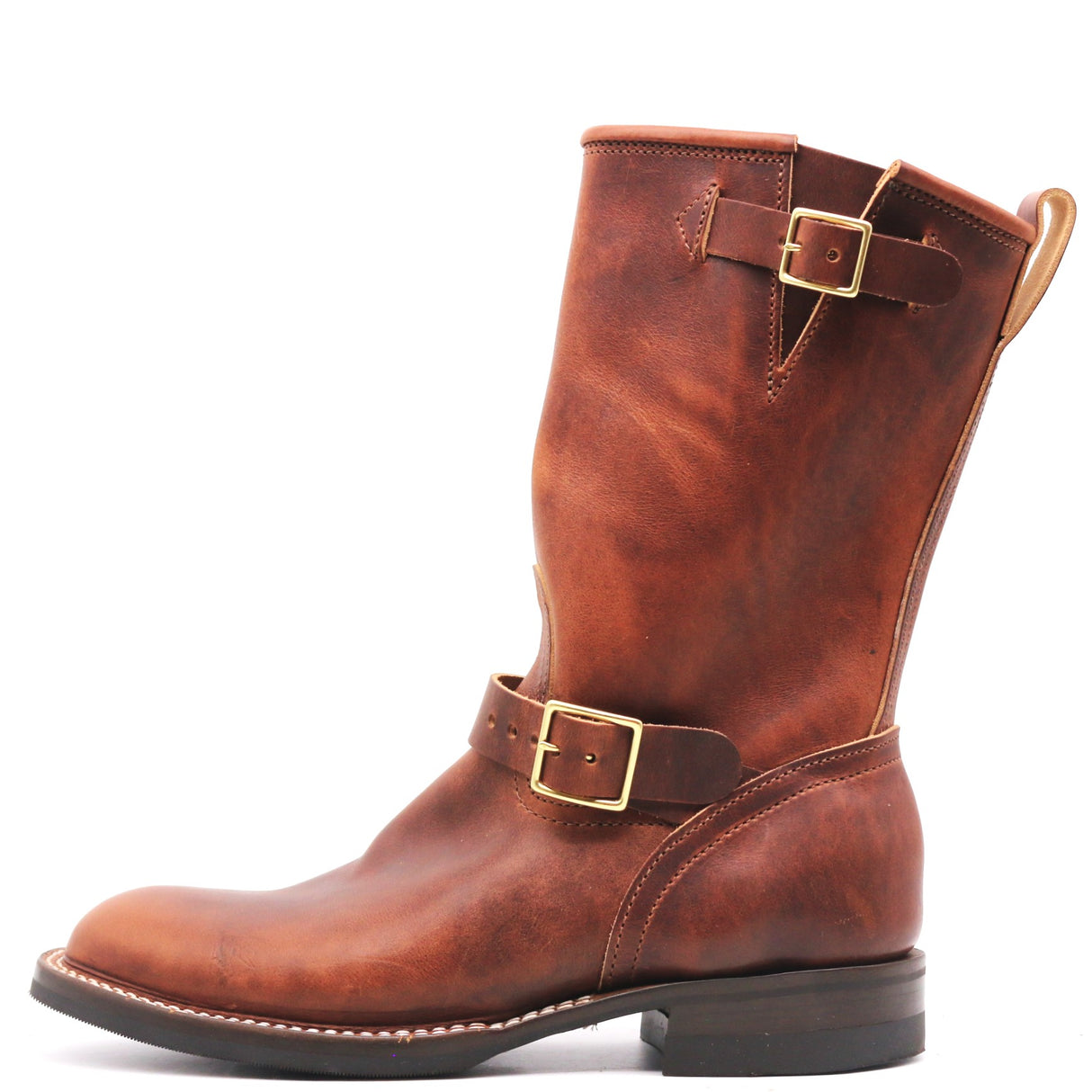 A mid-calf brown leather boot with gold-tone buckle straps, shown from a side profile on a white background.