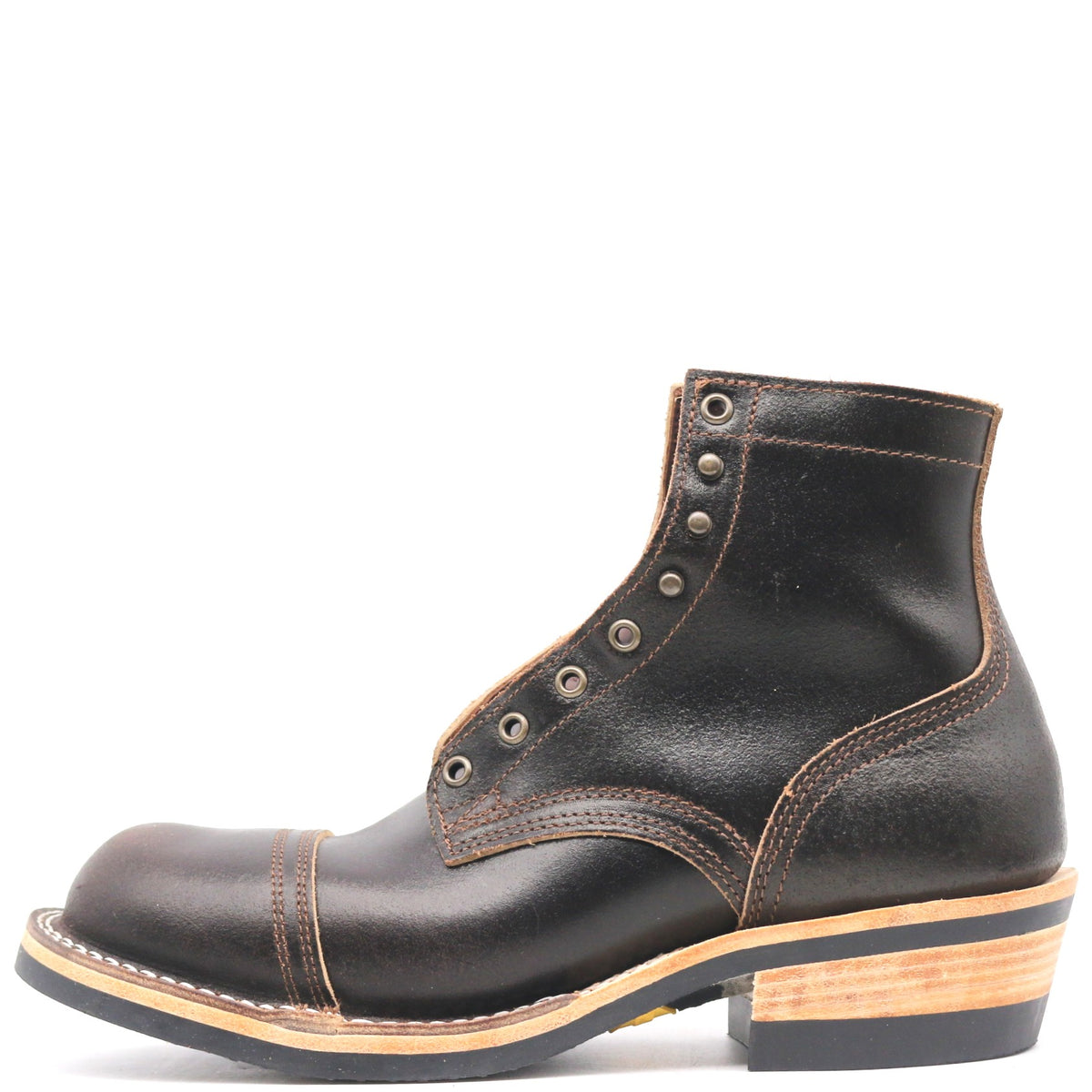 A single black leather lace-up ankle boot with a cap toe, decorative stitching, and a stacked wood-and-leather heel, shown from a side profile on a white background.