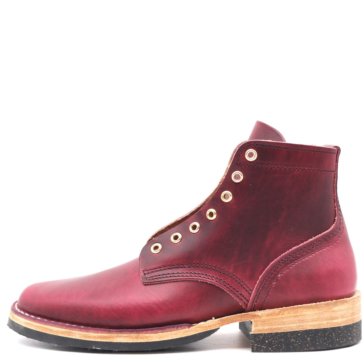 A single dark red leather lace-up ankle boot with brass eyelets, a stacked wood-look heel, and a black rubber outsole, shown from a side profile on a white background.