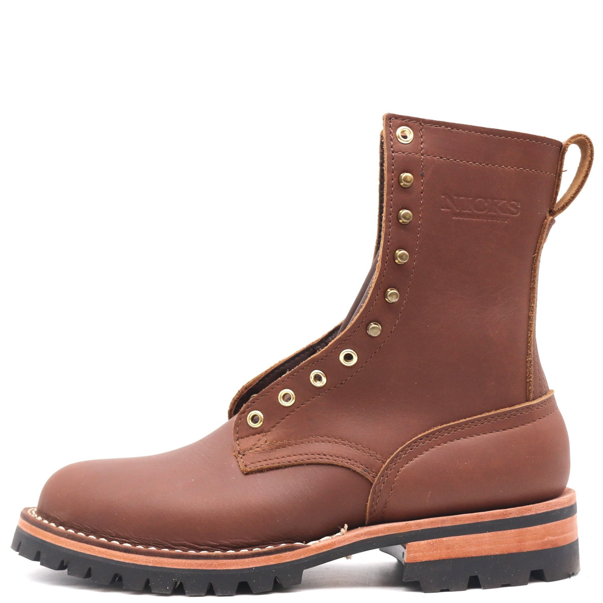 A brown leather work boot with brass eyelets, a pull loop, and a black lug sole, shown from a side profile on a white background.