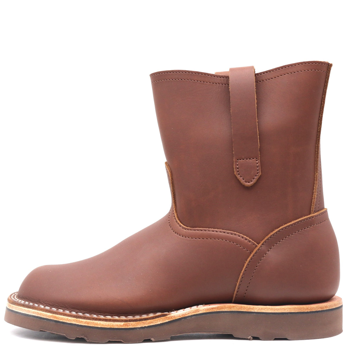 Brown pull on leather boot with side straps in front of a white background.