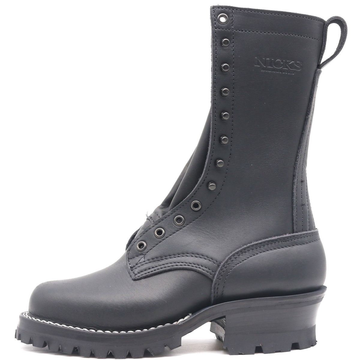A black leather lace-up work boot with a chunky lug sole and a pull tab, shown from a side profile on a white background. The brand name 'NICKS' is embossed on the side of the shaft.