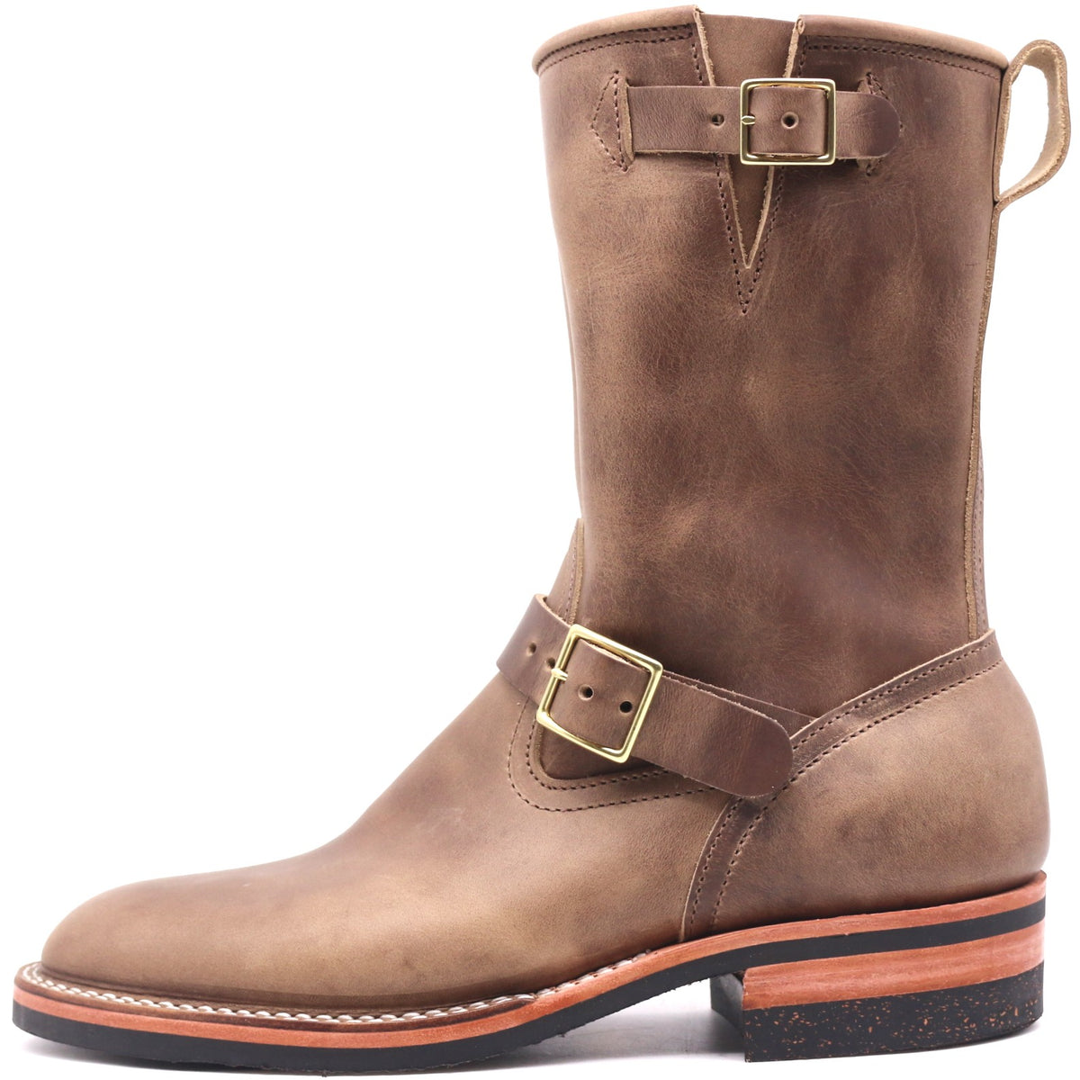 Tall engineer style brown leather boot with top and bottom buckles and rear pull loop in front of a white background.