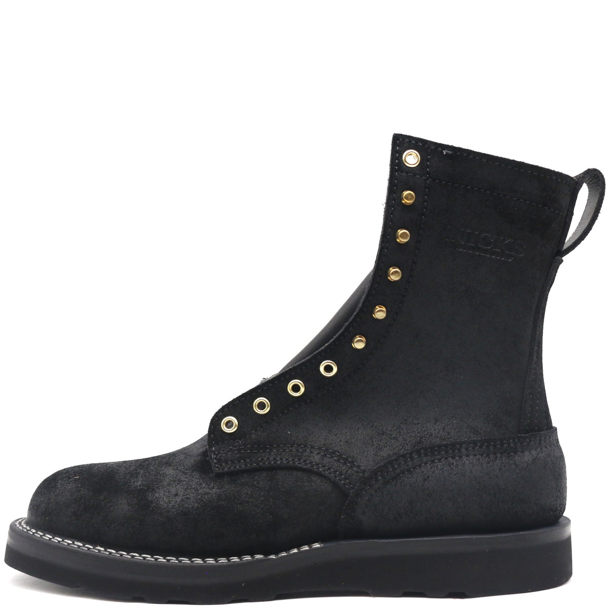 Black leather boot with brass hardware, rear pull loop, and black wedge outsole.