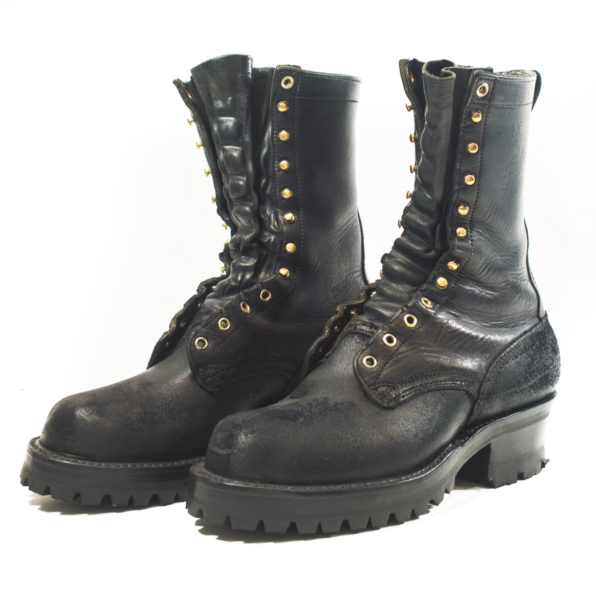 Pair of freshly rebuilt black boots