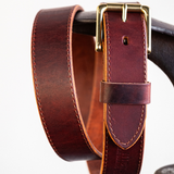 Zoomed in detail shot of buckle on Cypress Raisin Cherry Heritage belt