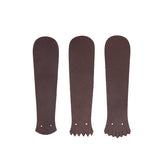 1964 Brown leather Kiltie varieties on a white background. 