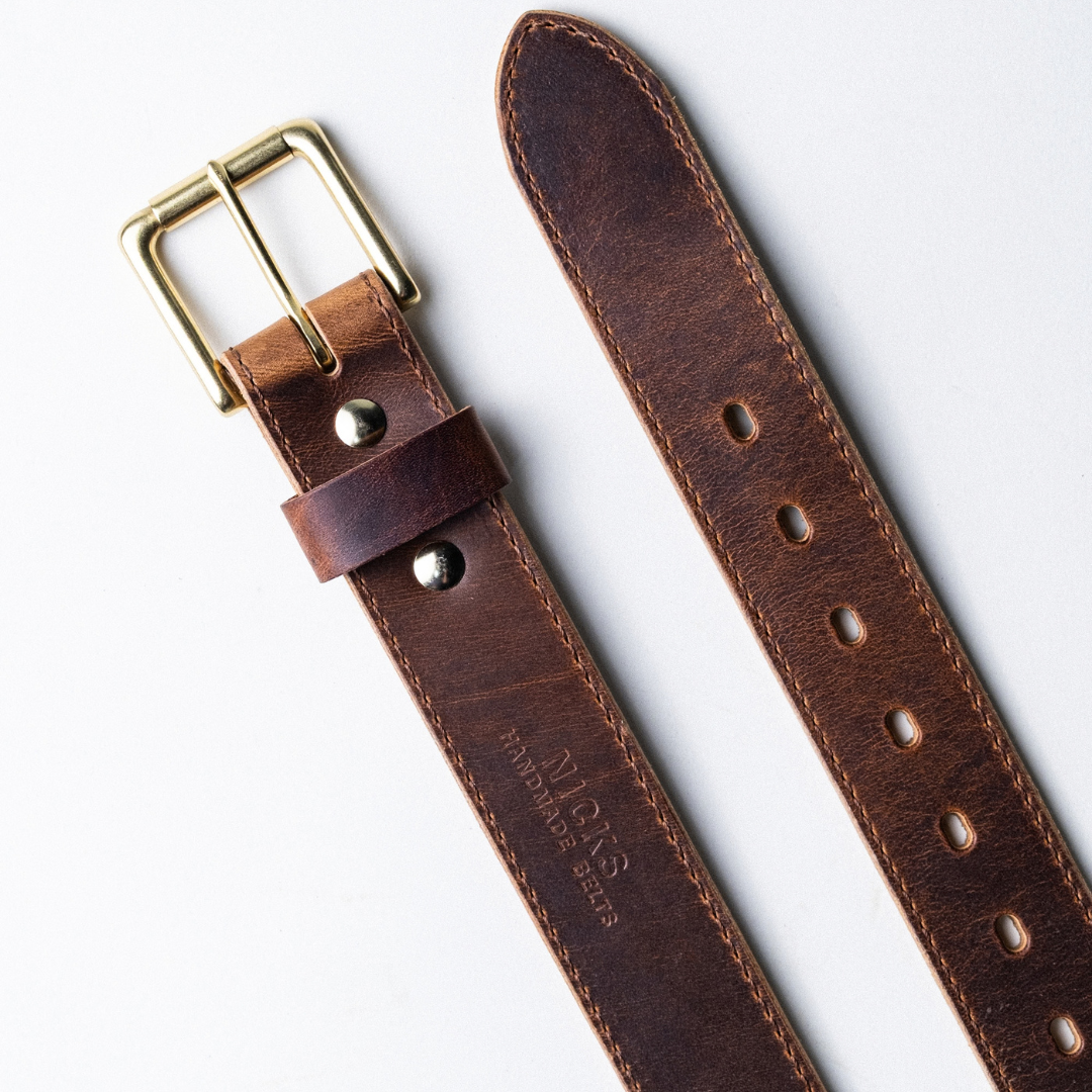 Cypress Moc belt laying on white background