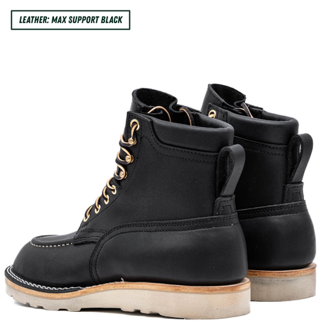 A pair of black leather lace-up boots shown from the side and back on a white background, with a text label in the top-left corner that reads 'LEATHER: MAX SUPPORT BLACK'.