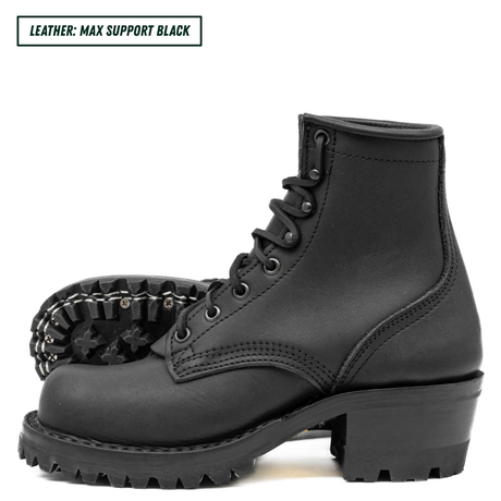 Black leather boot with chunky sole on a white background