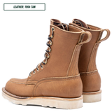 HD moc toe work boots, both sitting together facing right backward. Label on top left of picture that reads "LEATHER: 1964 TAN."