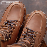 HD moc toe work boots, detail shot of moc toe stitching. Label on top left of picture that reads "LEATHER: 1964 TAN."