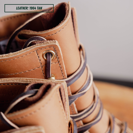 HD moc toe work boots, detail shot of top stitching. Label on top left of picture that reads "LEATHER: 1964 TAN."