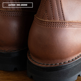 Close-up of a brown leather boot showing the heel and sole, with a text label in the top-left corner reading 'LEATHER: 1964 BROWN'.