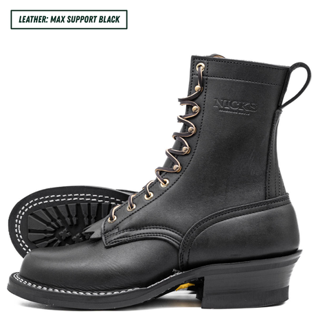 A black leather lace-up boot shown in side profile on a white background, with a second boot placed behind it to show the sole. The brand name 'NICKS' is embossed on the side, and a text label in the top-left corner reads 'LEATHER: MAX SUPPORT BLACK'.