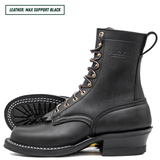 A black leather lace-up boot shown in side profile on a white background, with a second boot placed behind it to show the sole. The brand name 'NICKS' is embossed on the side, and a text label in the top-left corner reads 'LEATHER: MAX SUPPORT BLACK'.