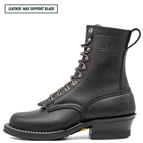 A black leather lace-up boot shown in profile on a white background, with a text label in the top-left corner that reads 'LEATHER: MAX SUPPORT BLACK'. The boot has a low block heel, white contrast stitching, and a pull tab at the heel.