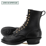 A pair of black leather lace-up boots with gold-tone eyelets and a low stacked heel, shown on a white background. One boot is in profile, and the other is turned to show the outsole.