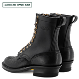 A pair of black leather lace-up boots shown from the side and back on a white background, with a text label in the top-left corner reading 'LEATHER: MAX SUPPORT BLACK'. The brand name 'NICKS' is embossed on the side of the boot.