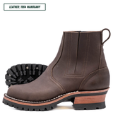 A dark brown leather Chelsea-style ankle boot with a chunky stacked heel, black lug sole, and a light tan midsole section. A black outsole is shown behind the main boot.