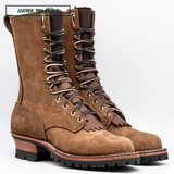 A pair of tall brown leather lace-up boots with metal eyelets, fringed leather details, and rugged black soles, shown on a light gray studio background. A small label in the top-left reads 'LEATHER - 1964 BROWN'.