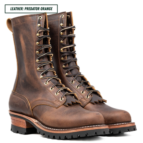 A pair of rugged lace-up boots in distressed brown leather, shown on a clean white background with a text label in the top-left corner that reads 'LEATHER: PREDATOR ORANGE'.