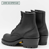 A pair of black leather lace-up ankle boots with chunky lug soles and low block heels, shown on a light gray background. A text label in the top-left corner reads 'LEATHER: MAX SUPPORT BLACK'.