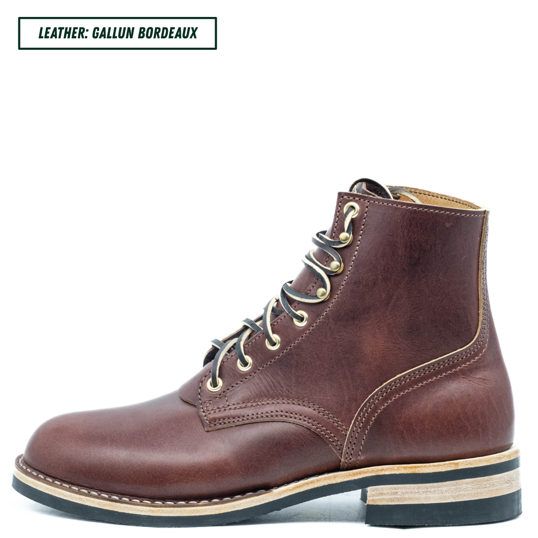 A single brown leather lace-up ankle boot shown in side profile on a white background, with a text label in the top-left corner reading 'LEATHER: GALLUN BORDEAUX'. The boot has dark brown laces, brass eyelets, and a stacked sole with a light wood-toned midlayer.