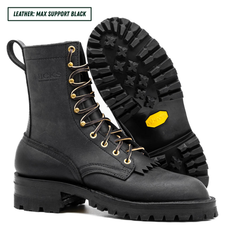All black leather boots with lug soles. One sitting up side profile while the other  is laying down showing the outsole. Top left reads "LEATHER: MAX SUPPORT BLACK."
