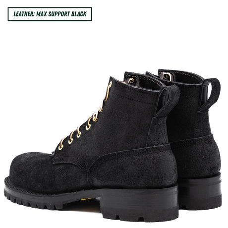 All black leather boots with lug soles. Boots sitting together facing back left. Top left reads "LEATHER: MAX SUPPORT BLACK."