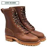 A pair of brown leather lace-up work boots shown on a white background with a text label in the top left corner that reads 'LEATHER: 1964 BROWN'.