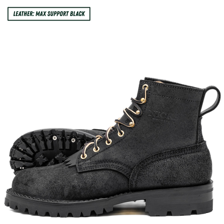 A pair of black leather lace-up boots with gold-toned metal eyelets and a rugged black sole, shown on a white background with a text label in the top-left corner reading 'LEATHER: MAX SUPPORT BLACK'.