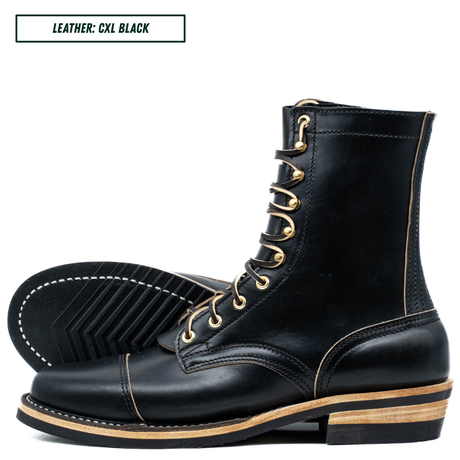 A pair of black leather lace-up boots shown on a white background, with one boot standing upright and the other lying on its side to display the treaded sole. A text label in the top left reads 'LEATHER: CXL BLACK'.