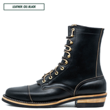 A black leather lace-up ankle boot with gold-tone eyelets and laces, featuring a stacked wood-look heel and light tan contrast stitching, shown on a white background with a text label in the top-left corner.