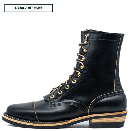 A black leather lace-up ankle boot with gold-tone eyelets and laces, featuring a stacked wood-look heel and light tan contrast stitching, shown on a white background with a text label in the top-left corner.