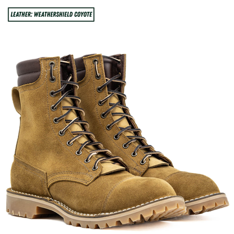 A pair of tan suede lace-up work boots with dark brown trim and laces, shown on a white background with a text label in the top left corner reading 'LEATHER: WEATHERSHIELD COYOTE'.