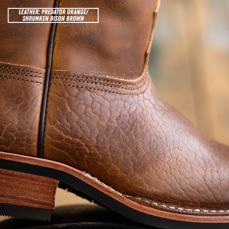 Detail shot of lower on Palouse western boot. Top left reads 'LEATHER: PREDATOR ORANGE/ SHRUNKEN BISON BROWN'.
