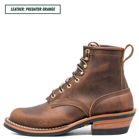 A single brown leather lace-up boot shown in side profile on a white background, with a text label in the top-left corner reading 'LEATHER: PREDATOR ORANGE'. The boot has a distressed medium-brown finish, brass eyelets, white stitching, and a stacked wood-look heel with a black outsole.