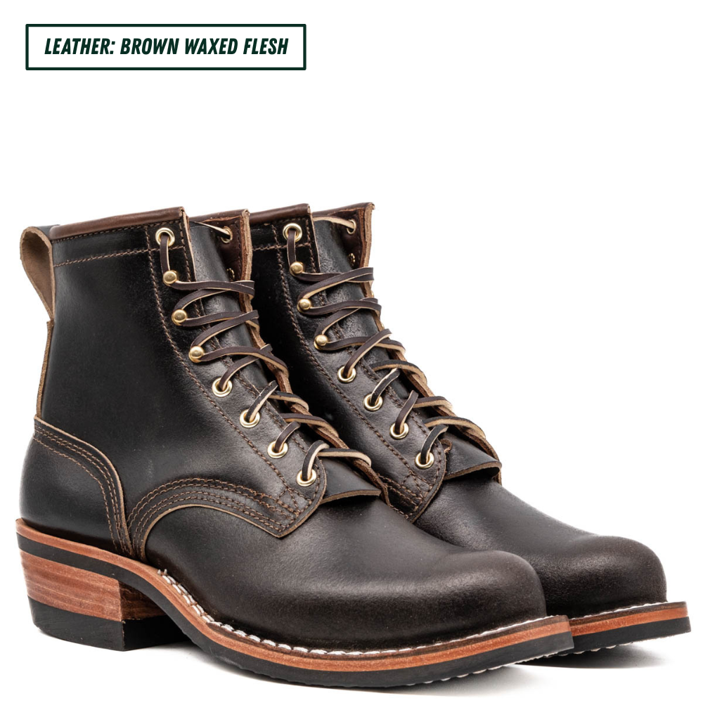 A pair of dark brown leather lace-up ankle boots with gold-tone eyelets and a stacked wood-look heel, shown on a white background with a text label reading 'LEATHER: BROWN WAXED FLESH'.