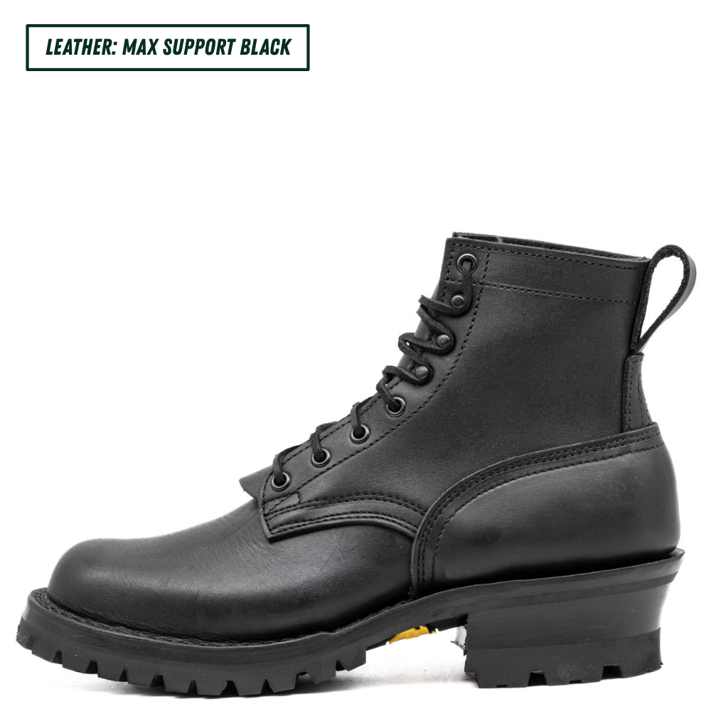 A black leather lace-up ankle boot with a rugged lug sole and heel pull tab, shown in profile on a white background. A text label in the top-left corner reads 'LEATHER: MAX SUPPORT BLACK'.