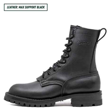 A black leather lace-up ankle boot shown in profile on a white background, with a small text label in the top-left corner reading 'LEATHER: MAX SUPPORT BLACK'. The boot has a pull tab, black laces, and a rugged sole.