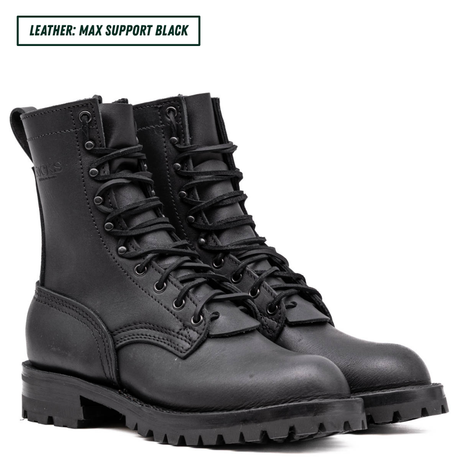 Pair of black leather boots on a white background